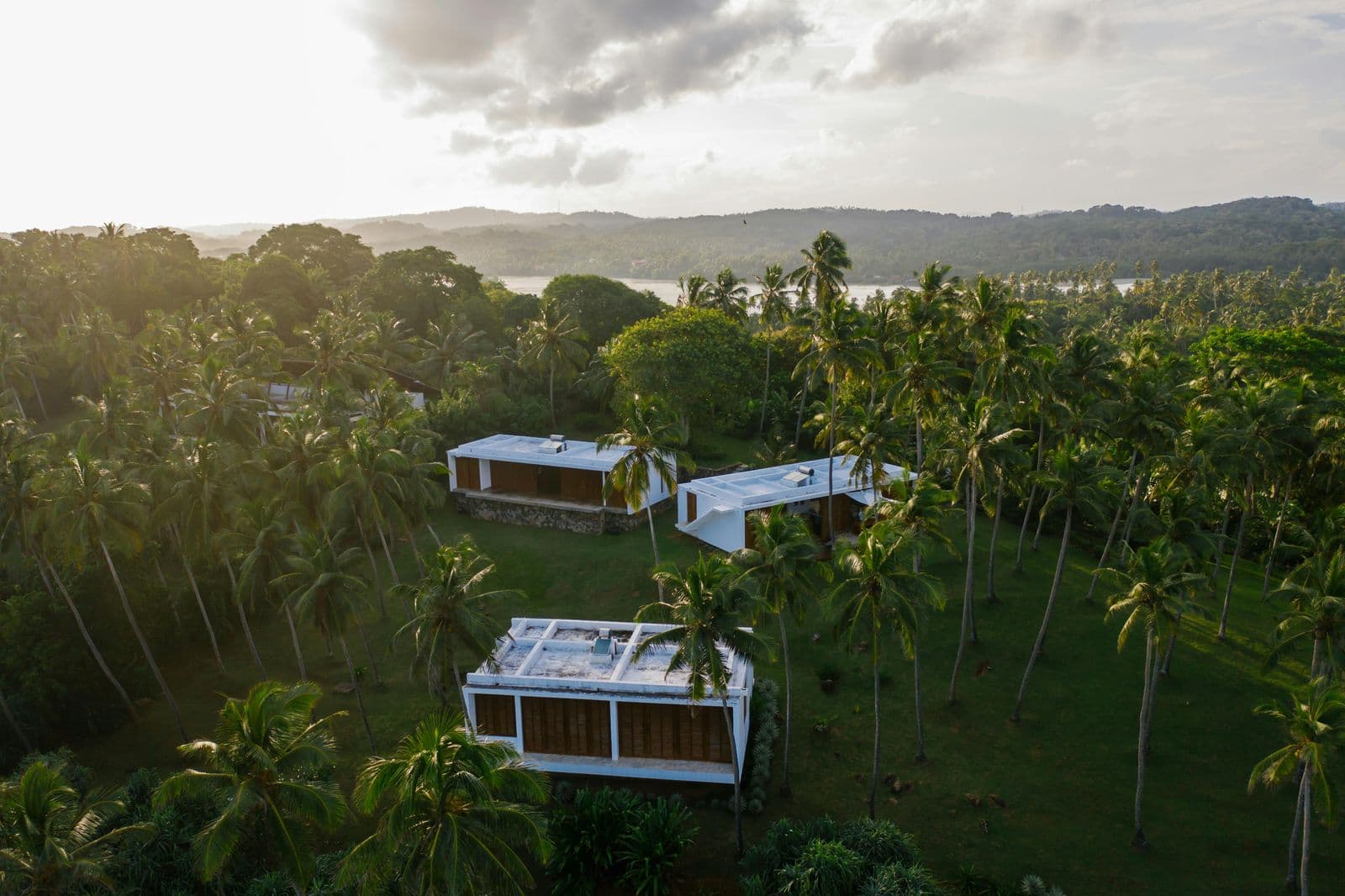 Modern villas on a hillside overlooking the ocean in Samaná
