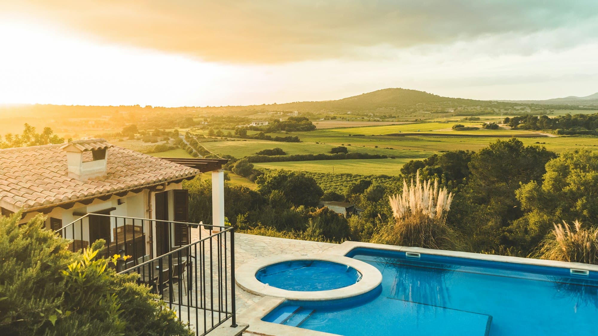 Stone villa with pool at sunset in the Dominican Republic